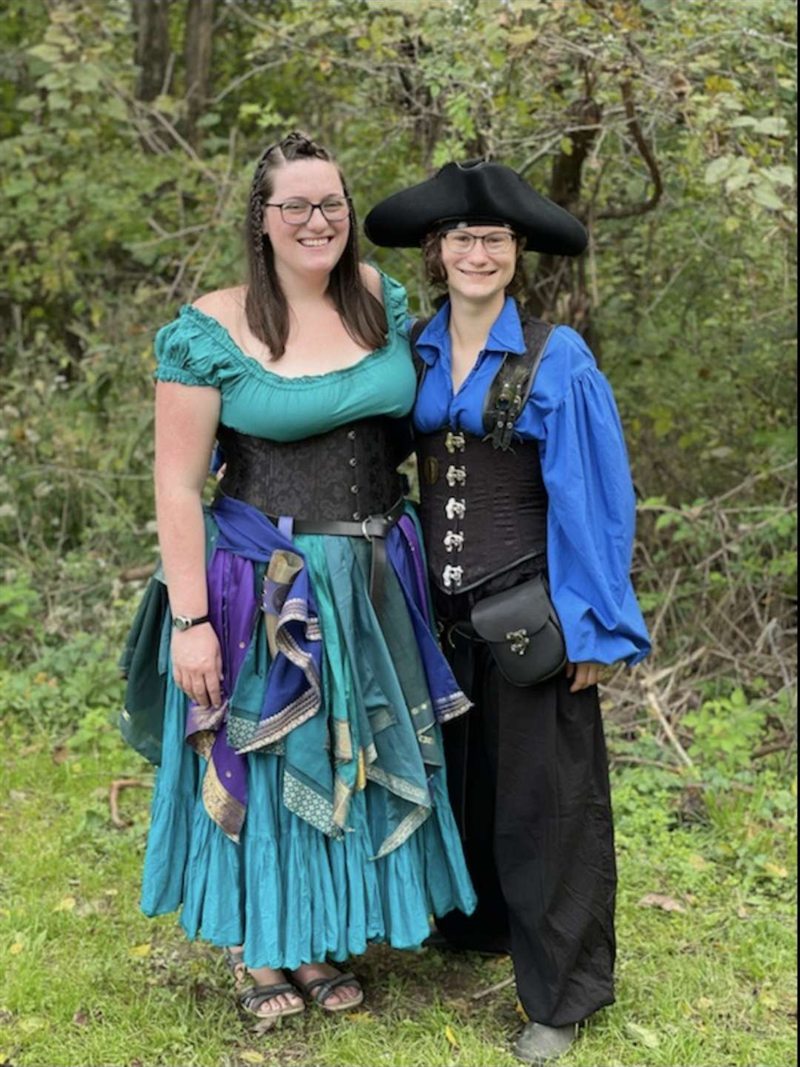 Photo of Emily in costume with her wife Katelin